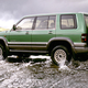 Illustration for article titled Here Are Some Pictures Of An Isuzu Trooper In A Stream